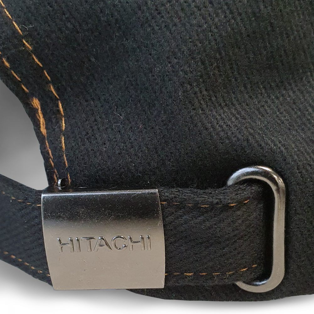 Sort Hitachi caps med orange søm